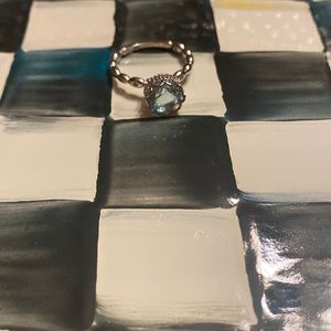 Sterling Aqua Blue solitaire ring with faux diamonds around band. 💙